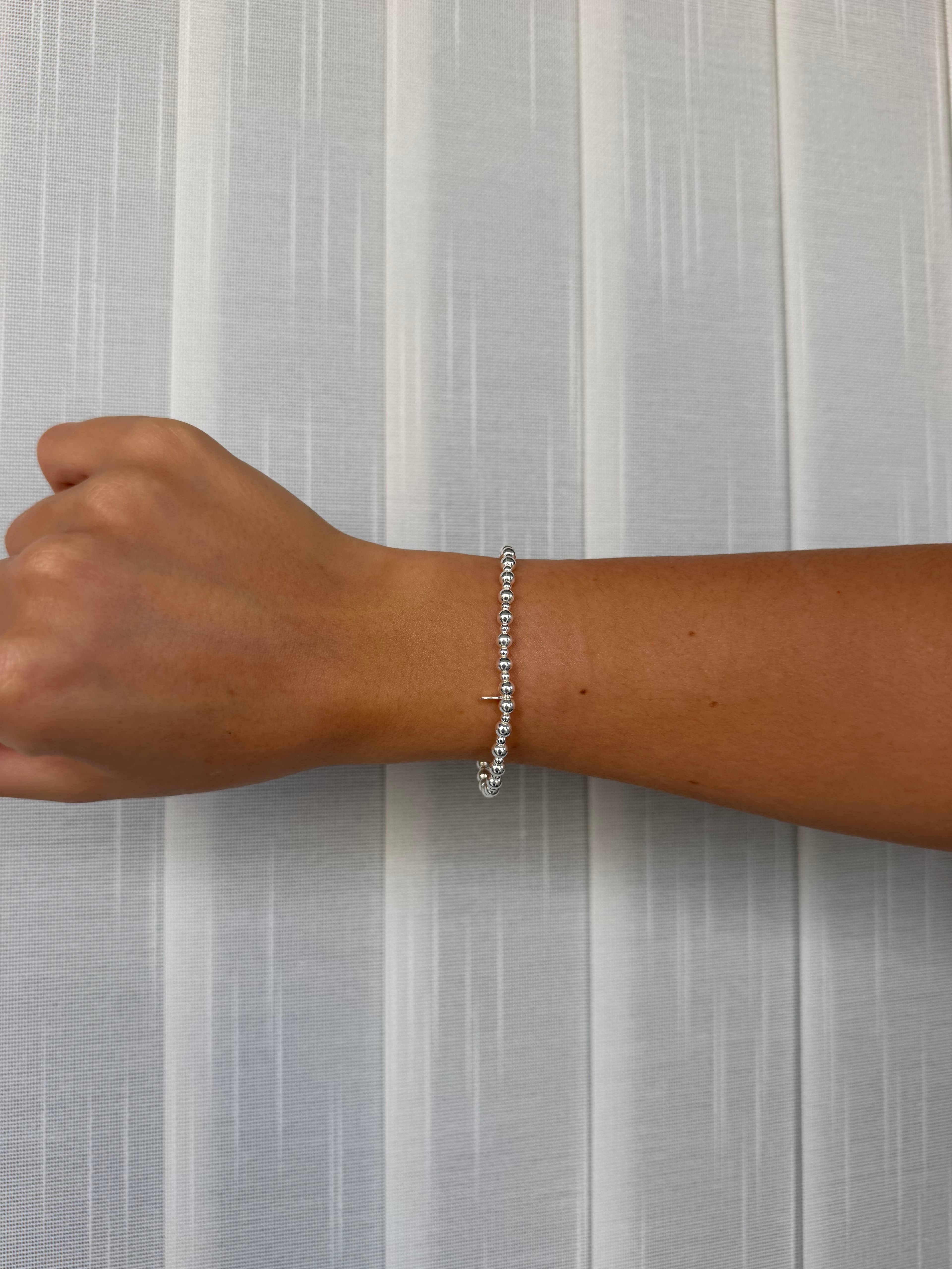 Pulsera elastica gruesa