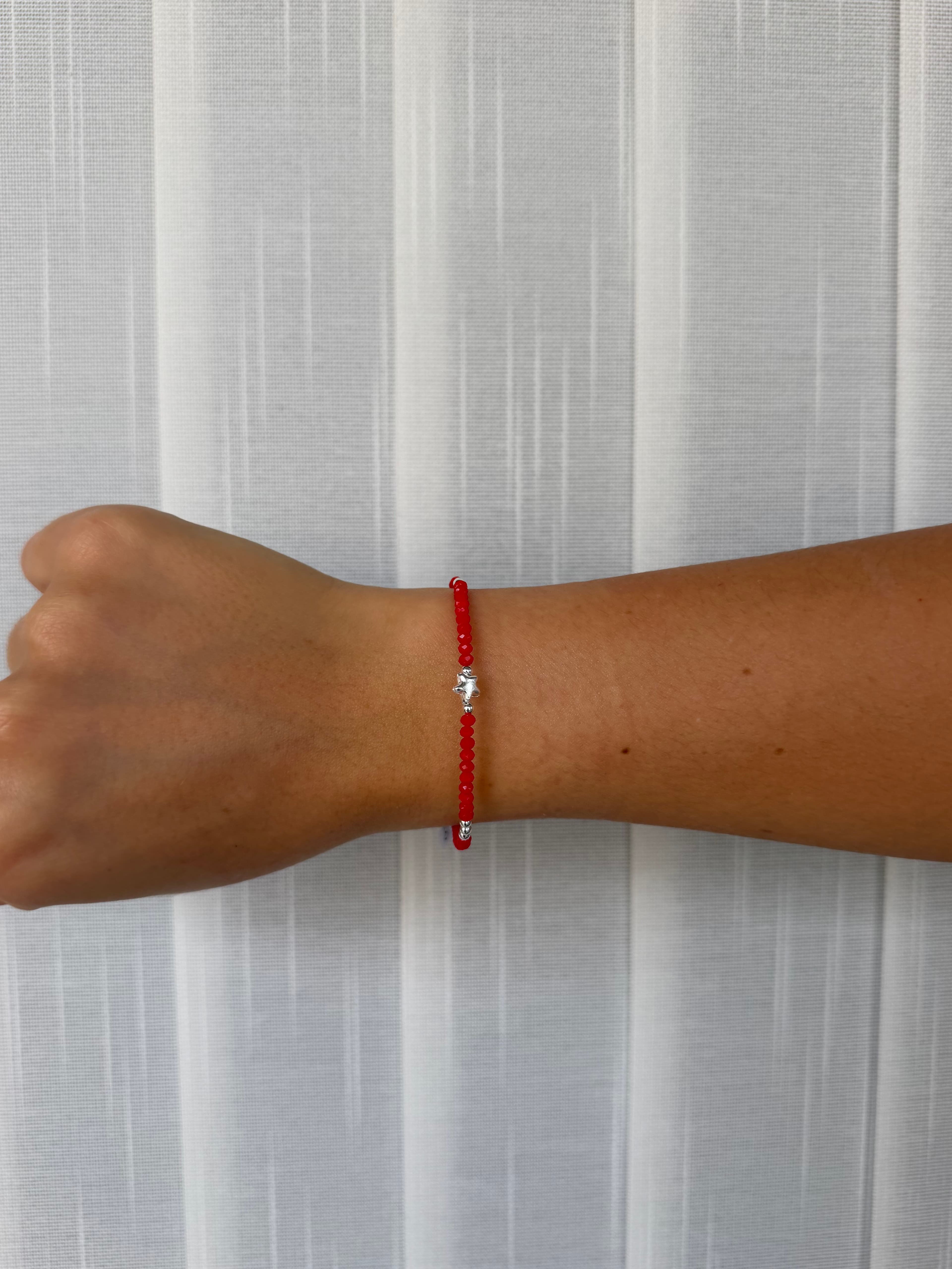 Pulsera roja estrella